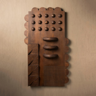 This is a brown sculpture art by Meso Casa LLC called roma wall art in standard