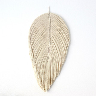 This is a natural sculpture art by Bharti Trivedi called macrame leaf in standard
