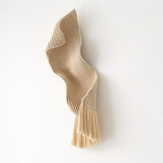 This is a beige sculpture art by Bharti Trivedi called ethereal in standard