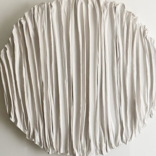 This is a white sculpture art by Kimberly George called linear on round in standard