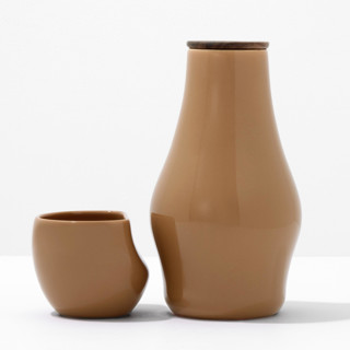 This is a brown tableware by Powered By People called elegant carafe and cup set - tan in standard