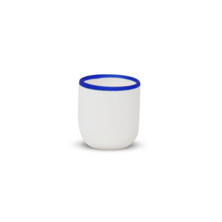 This is a multicolor tableware by Tina Frey called ligne short cup white with cobalt blue rim in standard