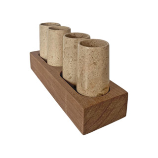 This is a beige tableware by Vanessa Sherwood called Tequila Shot Glasses Hand Carved out of Marble with Wooden Base - Made in Mexico (Beige) in standard.