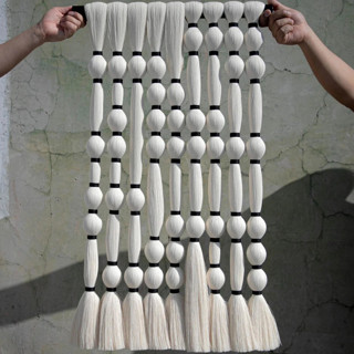 This is a white original textiles by Powered By People called mitla mini tapestry in standard