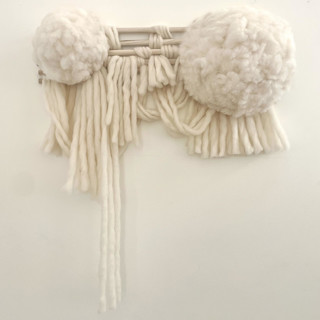 This is a white original textiles by Anya Dinovich called snow cloud 2 wall hanging in standard