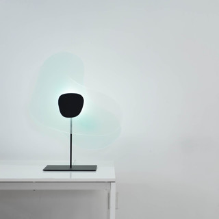 This is a green home decor by Richard Clarkson called aurora tabletop in standard