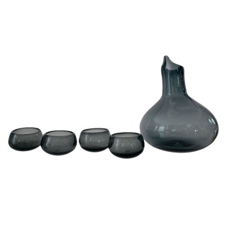 This is a gray tableware by Vanessa Sherwood called hand blown glass decanter set for mezcal, tequila or wine in smoke in standard