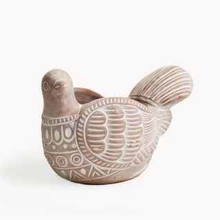 This is a natural accent pieces by KORISSA called handmade terracotta pot - turtle dove in standard