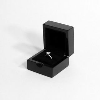 This is a black wedding accessories by Soulmatebox called gloss black ring box in standard