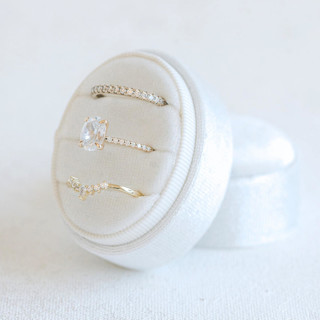 This is a white wedding accessories by The Heirloom Ring Box called snow white ring box (triple slot) in standard