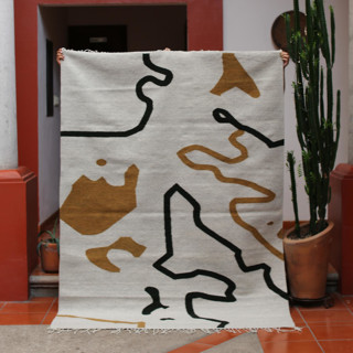 This is a multicolor rugs by Matiz called tuxtepec rug 5'x7' in standard