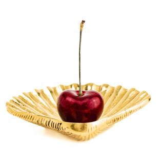 This is a gold tableware by Shelton Metal called shell dish in standard