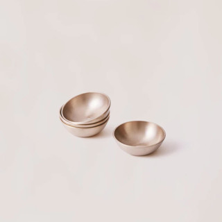 This is a bronze tableware by Powered By People called luxe kansa dip bowl set - set of 4 in standard