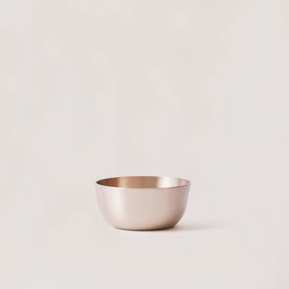 This is a bronze tableware by Powered By People called luxe kansa bowl in standard