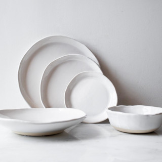 This is a white tableware by Handmade Studio TN called kinfolk dinnerware set in standard