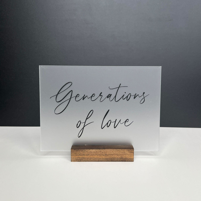 Frosted Acrylic Generations Of Love Sign, Black Lettering And Walnut