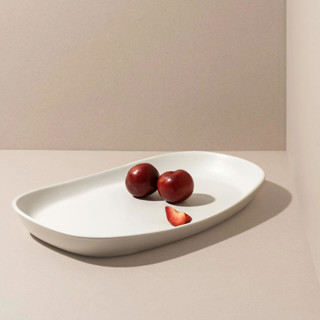This is a white tableware by Powered By People called mini long stoneware serving platters | dadasi in standard