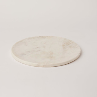 This is a beige tableware by Powered By People called elegant white marble serving platter with unique grey veining in standard