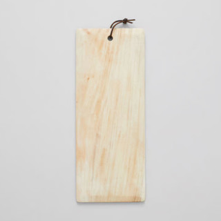 This is a beige tableware by Powered By People called blonde cedar long serving board in standard
