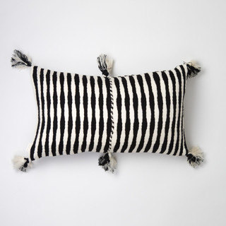 This is a black throw pillows by Archive New York called antigua black & ivory stripe pillow in standard