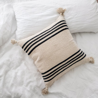 This is a multicolorassorted-colors throw pillows by Wool and Indigo called lexington stripe pom pillow in standard