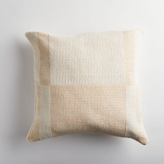 This is a beige throw pillows by Tatiana Ordoñez called paramo nieve cream pillow in standard