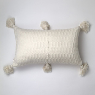 This is a white throw pillows by Archive New York called antigua natural white solid handwoven cotton throw pillow in standard