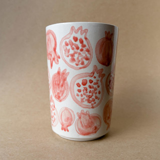 This is a multicolor tableware by Alexandra Dzh called unique handmade ceramic cup with pomegranates in standard