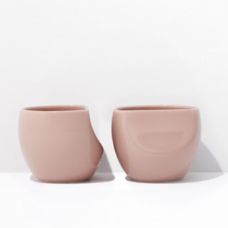 This is a pink tableware by Powered By People called fors studio s/2 medium cup - rose in standard