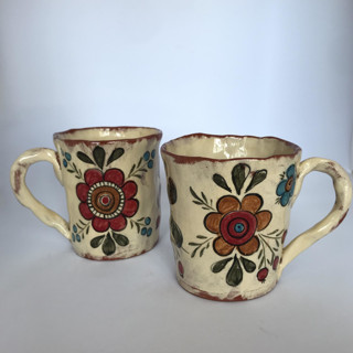 This is a beige tableware by Didem Firat called simple flower mugs, set-of-2 in standard