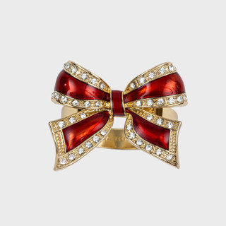 This is a red tableware by Joanna Buchanan called enamel bow skinny napkin rings, red, set of four in standard