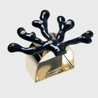 This is a blue tableware by Joanna Buchanan called coral napkin rings, navy, set of four in standard