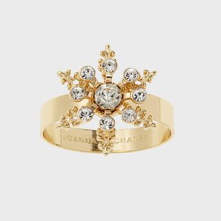 This is a brass tableware by Joanna Buchanan called classic snowflake skinny napkin rings, crystal, set of four in standard