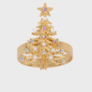 This is a brass tableware by Joanna Buchanan called christmas tree skinny napkin rings, set of four in standard