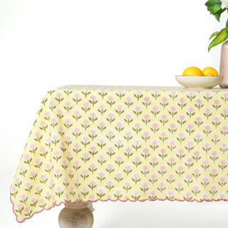 This is a yellow tableware by Inner Child called mona scallop embroidered blockprint tablecloth in butter yellow - 60x90 in standard