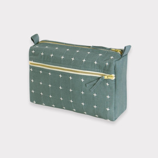 This is a green custom bag by Anchal called Medium Cross-Stitch Toiletry Bag - Spruce in standard.