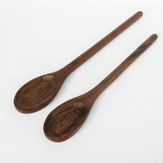 This is a brown tableware by Millstream Home called the small spoon in walnut in standard
