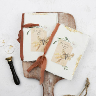 This is a multicolor vow books by Clove and Cedar Design called vintage moth custom wedding vow book | set of 2 | size 6x4.125 in standard