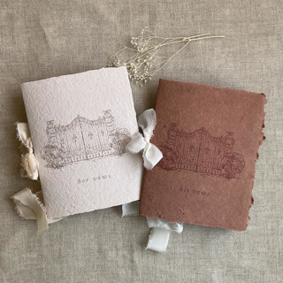 This is a copper vow books by Ivory Invitations called villa wedding vow books spice and sweet pea | set of 2 books | includes 1 her vows and 1 his vows in standard