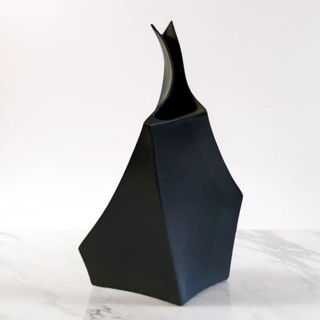 This is a black vases by DinaDecor called ceramic decorative sculptural vase - matt black geo tall in standard