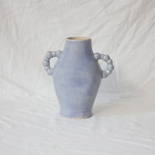 This is a purple vases by Erika Christine Ceramics called lavender beaded bud vase in standard