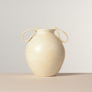 This is a beige vases by Rory Pots called heir vessel in standard