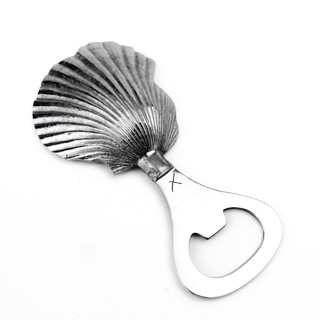 This is a silver tableware by Shelton Metal called shell bottle opener in standard