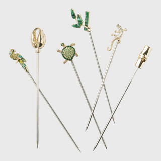 This is a gold tableware by Joanna Buchanan called palm beach cocktail picks in standard