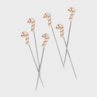 This is a red tableware by Joanna Buchanan called candy cane cocktail picks in standard