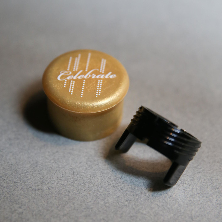 Celebrate Champagne Stopper Favors by Maire and Walt at CapaBunga Minted