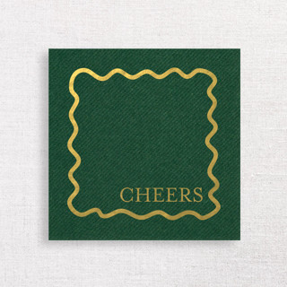 This is a green decorative paper napkins by Papel Custom Design called cheers holiday premium cocktail napkins | pack of 50 premium quality in standard