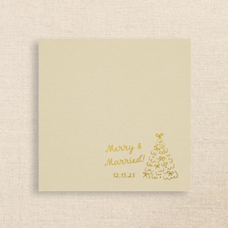 This is a beige decorative paper napkins by Papel Custom Design called merry & married champagne linen-like napkin with holiday tree design in standard