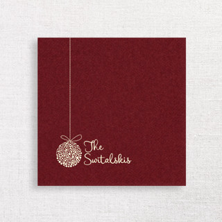 This is a red decorative paper napkins by Papel Custom Design called personalized burgundy holiday cocktail napkins with ornament icon | pack of 50 in standard