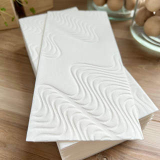 This is a natural decorative paper napkins by Prêt-à-PartyNY called luxe linen debossed napkins | retro ripple in simply white in standard
